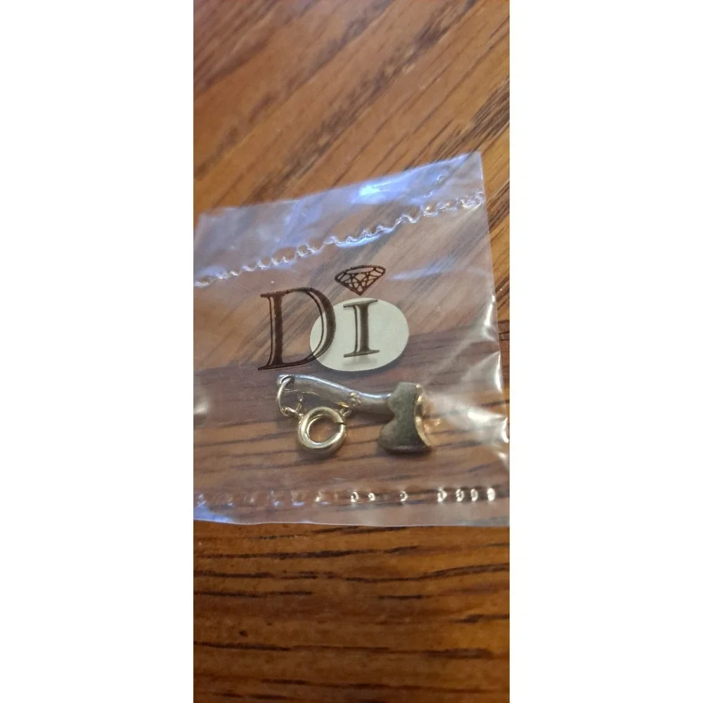 gold-tone axe charm from Diamonds International